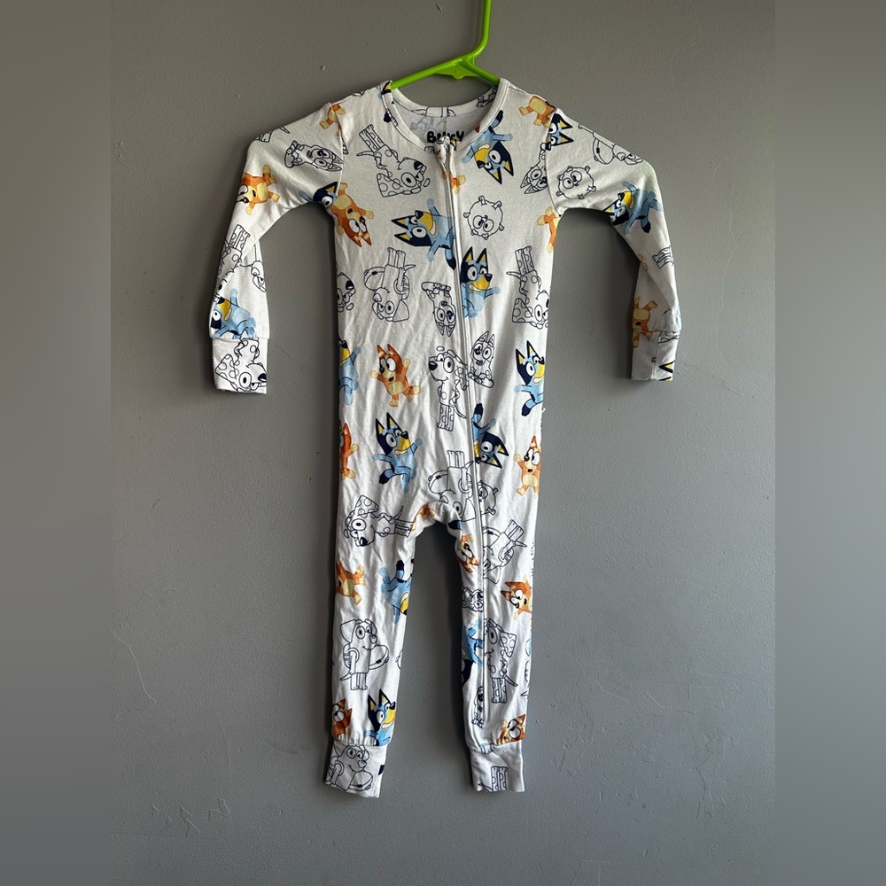 Children's White Zip Footed Pajamas with Blue and Orange Character Prints